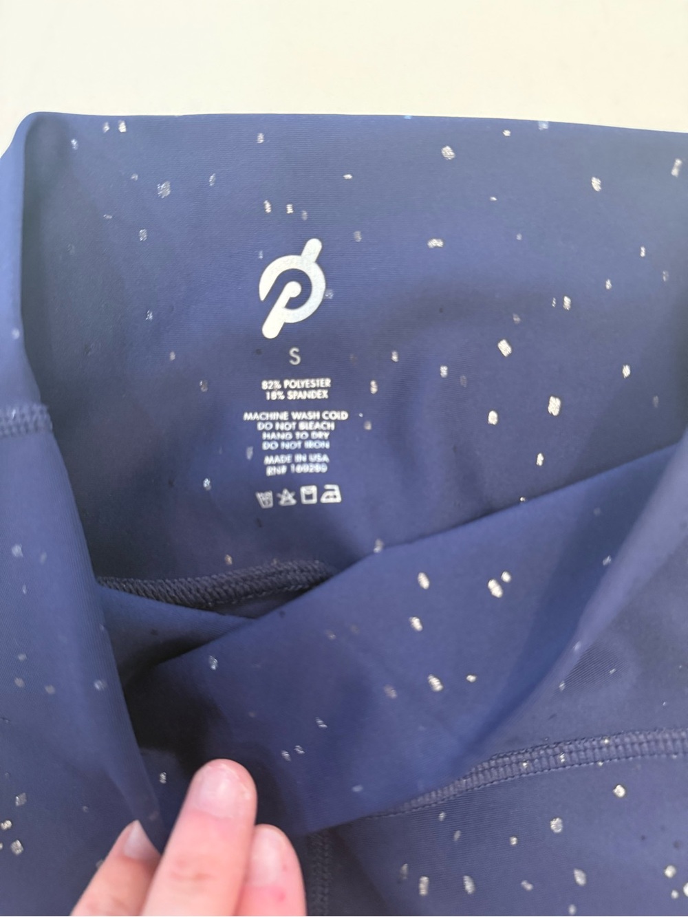 Peloton women’s Navy Performance leggings with Silver Speckle Print